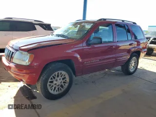 2002 Jeep Grand Cherokee Limited with VIN 1J4GW58NX2C138005, listed as a Copart auction lot 56314655 with 133,420 mi miles and Salvage title. Bid and sale history available at DreamBid. Image 1.