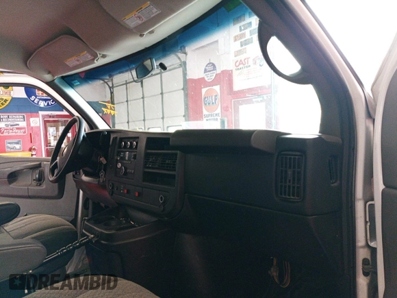 2014 Chevrolet Express Cargo Van with VIN 1GCWGFCA6E1197965, listed as a IAAI auction lot 42186151 with 199,293 mi miles. Bid and sale history available at carsss.com. Image 1.
