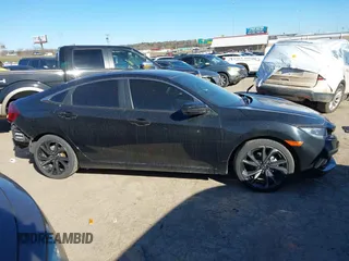 2019 Honda Civic Sport with VIN 19XFC2F80KE033598, listed as a IAAI auction lot 41732698 with 101,664 mi miles and . Bid and sale history available at DreamBid. Image 13.