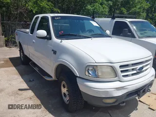 2000 Ford F-150 XL with VIN 1FTRX18W5YNA86292, listed as a IAAI auction lot 42457389 with Not provided miles and . Bid and sale history available at DreamBid. Image 1.