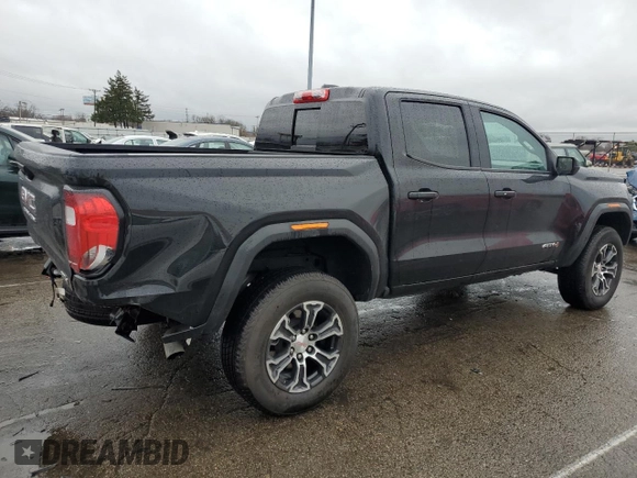 2023 GMC Canyon 4WD AT4 with VIN 1GTP6DEK6P1139567, listed as a Copart auction lot 85416794 with 26,583 mi miles and Salvage Title. Bid and sale history available at carsss.com. Image 3.