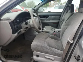 2002 Buick Regal LS with VIN 2G4WB52K321285571, listed as a Copart auction lot 57562465 with 91,352 mi miles and Salvage title. Bid and sale history available at DreamBid. Image 7.