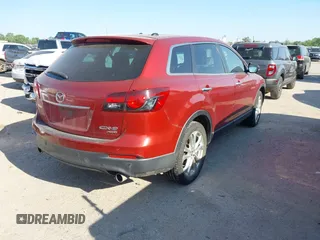 2013 Mazda CX-9 Grand Touring with VIN JM3TB3DAXD0408076, listed as a IAAI auction lot 42029113 with 224,753 mi miles and . Bid and sale history available at DreamBid. Image 4.