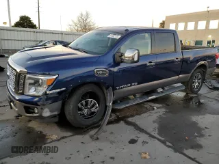 2018 Nissan Titan XD SV with VIN 1N6AA1F44JN518454, listed as a Copart auction lot 81082124 with 82,010 mi miles and Salvage Title. Bid and sale history available at carsss.com. Image 1.