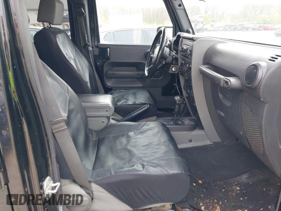 2007 Jeep Wrangler Unlimited X with VIN 1J4GA39177L153387, listed as a IAAI auction lot 42021211 with 207,965 mi miles and . Bid and sale history available at DreamBid. Image 5.
