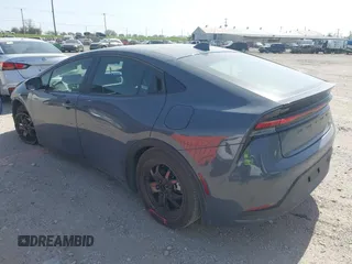 2024 Toyota Prius LE with VIN JTDACAAU1R3015833, listed as a IAAI auction lot 41824504 with 31,574 mi miles. Bid and sale history available at carsss.com. Image 3.
