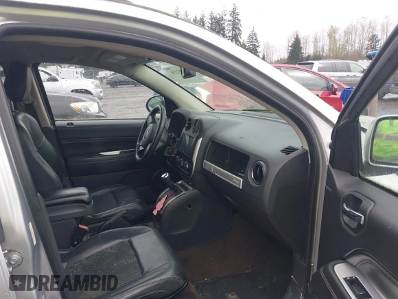 2014 Jeep Compass Latitude with VIN 1C4NJCEAXED522723, listed as a IAAI auction lot 41907230 with 98,252 mi miles and . Bid and sale history available at carsss.com. Image 5.