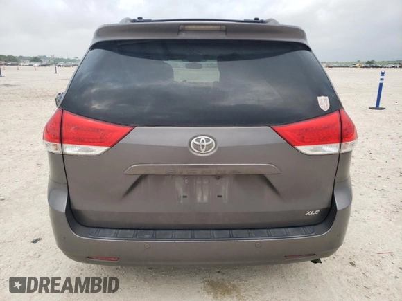 2014 Toyota Sienna XLE with VIN 5TDYK3DC2ES510647, listed as a Copart auction lot 54488845 with 216,091 mi miles and Salvage Title. Bid and sale history available at DreamBid. Image 6.