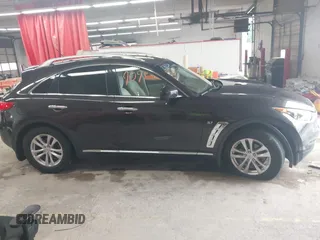 2016 Infiniti QX70 z VIN JN8CS1MW6GM752420, wystawiony jako IAAI lot #42509091 z przebiegiem 55 196 mil mil oraz . Historia ofert i sprzedaży dostępna na DreamBid. Obrazek 13.