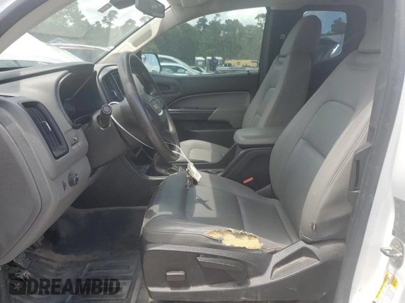 2015 GMC Canyon with VIN 1GTH51EA9F1263487, listed as a Copart auction lot 64905974 with 123,596 mi miles and Clean title. Bid and sale history available at DreamBid. Image 7.