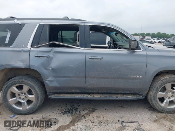 2020 Chevrolet Tahoe LT with VIN 1GNSCBKC1LR103972, listed as a IAAI auction lot 42148438 with 94,640 mi miles and . Bid and sale history available at DreamBid. Image 13.