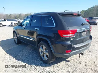 2013 Jeep Grand Cherokee Overland with VIN 1C4RJECG7DC644822, listed as a IAAI auction lot 41658872 with 156,838 mi miles. Bid and sale history available at carsss.com. Image 3.