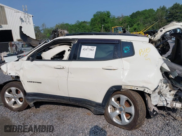 2018 Jeep Compass Latitude with VIN 3C4NJDBB4JT270975, listed as a IAAI auction lot 42477582 with 98,629 mi miles and . Bid and sale history available at DreamBid. Image 6.