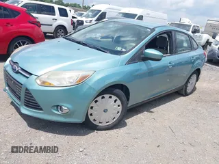 2012 Ford Focus SE with VIN 1FAHP3F2XCL240934, listed as a IAAI auction lot 42673102 with 188,658 mi miles and . Bid and sale history available at DreamBid. Image 2.
