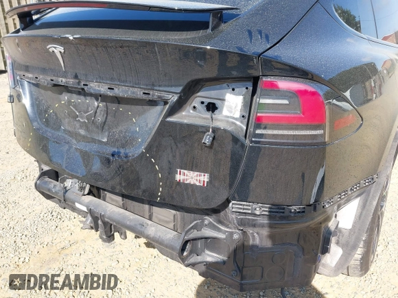 2022 Tesla Model X with VIN 7SAXCAE59NF346186, listed as a IAAI auction lot 41893923 with Not Provided miles and . Bid and sale history available at DreamBid. Image 13.