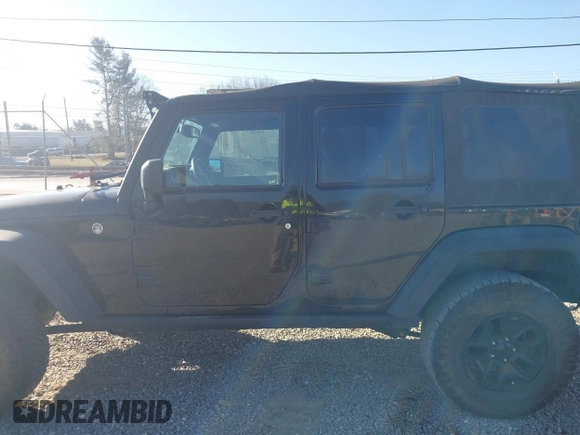 2016 Jeep Wrangler Unlimited Sport with VIN 1C4BJWDG0GL123581, listed as a IAAI auction lot 41426577 with 102,301 mi miles and . Bid and sale history available at DreamBid. Image 14.