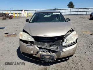 2006 Pontiac G6 6-Cyl z VIN 1G2ZG558364240017, wystawiony jako Copart lot #59183785 z przebiegiem 48 484 mil mil oraz Szkoda całkowita • Salvage title. Historia ofert i sprzedaży dostępna na DreamBid. Obrazek 5.