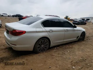 2018 BMW 5 Series 530i with VIN WBAJA5C53JG898430, listed as a Copart auction lot 54243195 with 129,854 mi miles and Salvage title. Bid and sale history available at DreamBid. Image 3.
