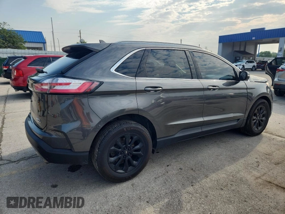 2020 Ford Edge SEL с VIN 2FMPK4J97LBA71577, выставлен на аукционе Copart как лот 60028525 с пробегом 66 365 миль миль и Списание • Salvage title. История ставок и продаж доступна на DreamBid. Изображение 3.