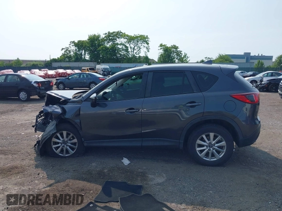 2016 Mazda CX-5 Sport with VIN JM3KE4BY7G0893984, listed as a IAAI auction lot 42479813 with Not provided miles and . Bid and sale history available at DreamBid. Image 15.