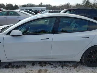 2020 Tesla Model 3 Standard Range Plus with VIN 5YJ3E1EA7LF742973, listed as a IAAI auction lot 41409285 with 48,993 mi miles and . Bid and sale history available at DreamBid. Image 14.