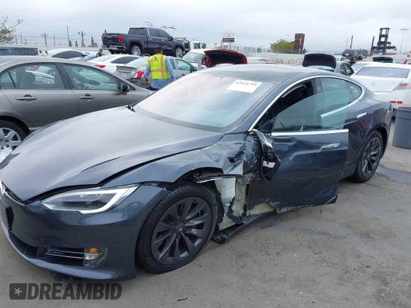 2017 Tesla Model S 100D with VIN 5YJSA1E20HF228681, listed as a IAAI auction lot 42424793 with Not provided miles and . Bid and sale history available at DreamBid. Image 2.