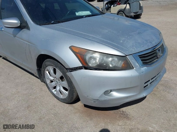 2009 Honda Accord Sdn EX-L with VIN 1HGCP36849A009901, listed as a IAAI auction lot 42057198 with 130,306 mi miles. Bid and sale history available at carsss.com. Image 6.