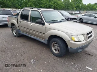 2005 Ford Explorer Sport Trac XLS z VIN 1FMZU77K65UA53244, wystawiony jako IAAI lot #42375234 z przebiegiem 240 441 mil mil oraz . Historia ofert i sprzedaży dostępna na DreamBid. Obrazek 1.