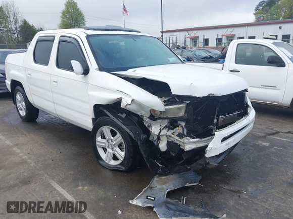 2014 Honda Ridgeline RTL with VIN 5FPYK1F58EB011186, listed as a IAAI auction lot 41903178 with 113,364 mi miles. Bid and sale history available at carsss.com. Image 1.