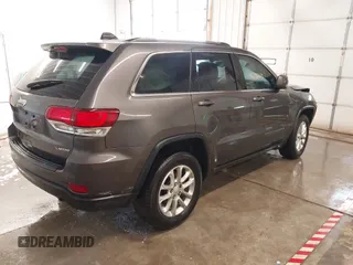2021 Jeep Grand Cherokee Laredo X with VIN 1C4RJEAG4MC713856, listed as a IAAI auction lot 42446805 with 105,611 mi miles and . Bid and sale history available at DreamBid. Image 4.