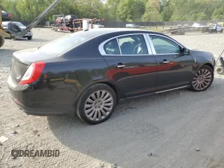 2014 Lincoln MKS with VIN 1LNHL9EK2EG610291, listed as a Copart auction lot 54544745 with 147,075 mi miles and Salvage Title. Bid and sale history available at carsss.com. Image 3.