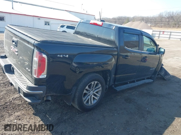 2015 GMC Canyon 4WD SLE with VIN 1GTG6BE36F1239678, listed as a IAAI auction lot 41705879 with 149,851 mi miles and . Bid and sale history available at carsss.com. Image 4.