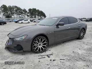 2016 Maserati Ghibli z VIN ZAM57XSA3G1179487, wystawiony jako Copart lot #41843275 z przebiegiem 72 527 mil mil oraz Szkody całkowita. Historia ofert i sprzedaży dostępna na DreamBid. Obrazek 1.