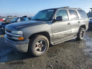 2000 Chevrolet Tahoe LS with VIN 1GNEK13T7YJ170140, listed as a Copart auction lot 87924735 with 263,669 mi miles and Clean title. Bid and sale history available at DreamBid. Image 1.