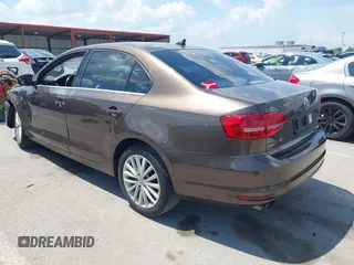 2015 Volkswagen Jetta SE with VIN 3VWD07AJ0FM214295, listed as a IAAI auction lot 42593549 with 62,720 mi miles and . Bid and sale history available at DreamBid. Image 3.