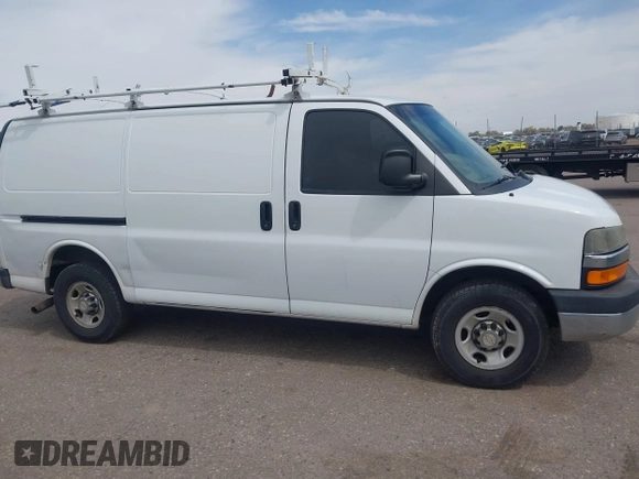 2012 Chevrolet Express Cargo Van with VIN 1GCWGFCA7C1121989, listed as a IAAI auction lot 42118853 with 214,478 mi miles. Bid and sale history available at carsss.com. Image 13.