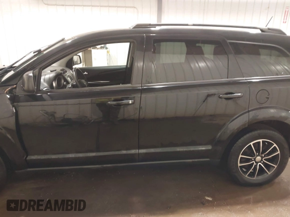 2017 Dodge Journey SE z VIN 3C4PDCAB4HT695490, wystawiony jako IAAI lot #41301719 z przebiegiem 103 642 mil mil oraz . Historia ofert i sprzedaży dostępna na DreamBid. Obrazek 15.