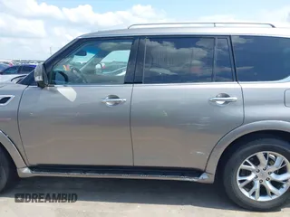 2012 Infiniti QX56 7-passenger z VIN JN8AZ2NF9C9517675, wystawiony jako IAAI lot #42138696 z przebiegiem 129 478 mil mil oraz . Historia ofert i sprzedaży dostępna na DreamBid. Obrazek 14.