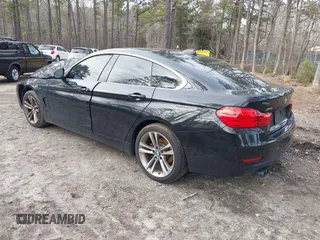 2017 BMW 4 Series 430i xDrive z VIN WBA4F9C54HG440122, wystawiony jako IAAI lot #41615681 z przebiegiem 121 938 mil mil oraz . Historia ofert i sprzedaży dostępna na DreamBid. Obrazek 3.