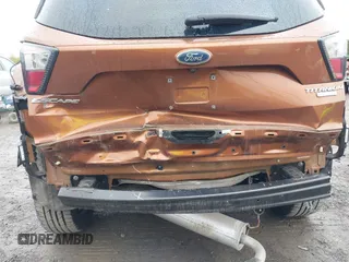 2017 Ford Escape Titanium with VIN 1FMCU0JD3HUB20846, listed as a IAAI auction lot 42182260 with 28,610 mi miles and . Bid and sale history available at DreamBid. Image 6.