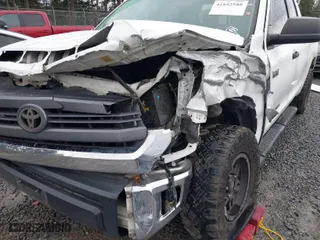 2014 Toyota Tundra 2WD Truck SR with VIN 5TFRY5F15EX170804, listed as a IAAI auction lot 41892588 with 144,295 mi miles. Bid and sale history available at carsss.com. Image 6.