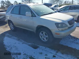 1999 Lexus RX 300 Luxury SUV with VIN JT6HF10U3X0052413, listed as a IAAI auction lot 41404927 with 211,660 mi miles. Bid and sale history available at carsss.com. Image 1.