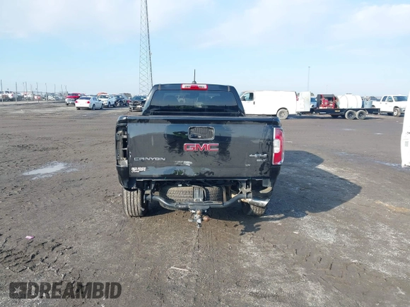 2015 GMC Canyon 4WD SLT with VIN 1GTG6CE34F1153369, listed as a IAAI auction lot 41277810 with 135,821 mi miles. Bid and sale history available at carsss.com. Image 16.