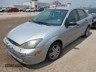 2004 Ford Focus ZTS with VIN 1FAFP38Z54W124641, listed as a IAAI auction lot 42163060 with 162,330 mi miles and . Bid and sale history available at carsss.com. Image 2.