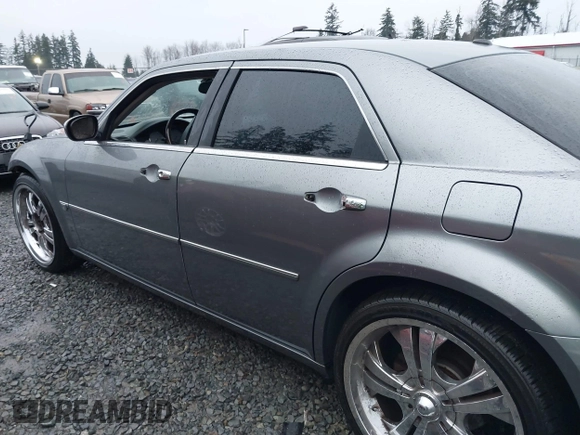 2006 Chrysler 300 C with VIN 2C3KA63H06H286676, listed as a IAAI auction lot 41231230 with 134,565 mi miles. Bid and sale history available at carsss.com. Image 14.