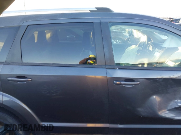 2018 Dodge Journey Crossroad with VIN 3C4PDDGGXJT386542, listed as a IAAI auction lot 40976857 with 147,853 mi miles and . Bid and sale history available at DreamBid. Image 13.