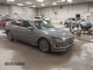 2022 Hyundai Sonata Hybrid SEL with VIN KMHL34JJ5NA047976, listed as a IAAI auction lot 41350961 with 25,063 mi miles. Bid and sale history available at carsss.com. Image 1.