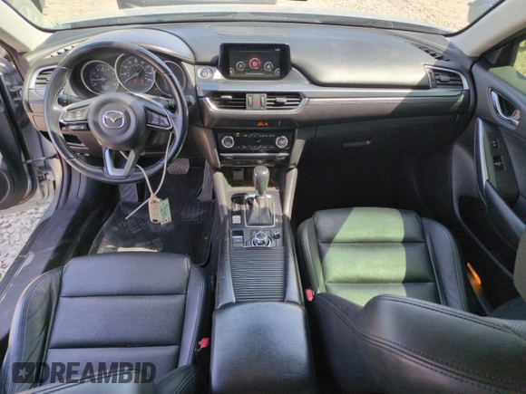 2017 Mazda 6 Touring with VIN JM1GL1V50H1114957, listed as a Copart auction lot 52309915 with 88,761 mi miles and Salvage Title. Bid and sale history available at DreamBid. Image 8.