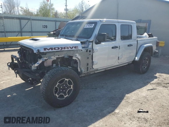 2023 Jeep Gladiator Mojave with VIN 1C6JJTEGXPL547222, listed as a Copart auction lot 52143545 with 28,586 mi miles and Salvage title. Bid and sale history available at DreamBid. Image 1.
