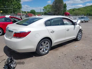 2012 Buick LaCrosse Premium 1 z VIN 1G4GD5E34CF130301, wystawiony jako IAAI lot #42205574 z przebiegiem 117 941 mil mil oraz . Historia ofert i sprzedaży dostępna na DreamBid. Obrazek 4.